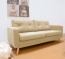 3-Sitzer in kräftigem beige mit 2 Couchkissen 3-Sitzer in kräftigem beige mit 2 Couchkissen