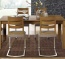 Klassisch eleganter Tisch mit faszinierenden Design-Details Klassisch eleganter Tisch mit faszinierenden Design-Details