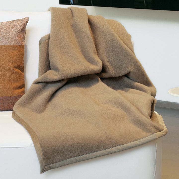Heimdecke aus Cashmerehaar und Merino-Lammwolle Heimdecke aus Cashmerehaar und Merino-Lammwolle