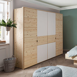 Cervino: Aromatisches Zirbenholz kombiniert mit elegantem Weißglas Aromatisches Zirbenholz kombiniert mit elegantem Weißglas beim Modell Cervino