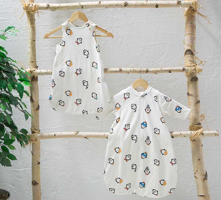 Baby-Schlafsack mit fröhlichem Pinguin-Motiv Baby-Schlafsack mit fröhlichem Pinguin-Motiv