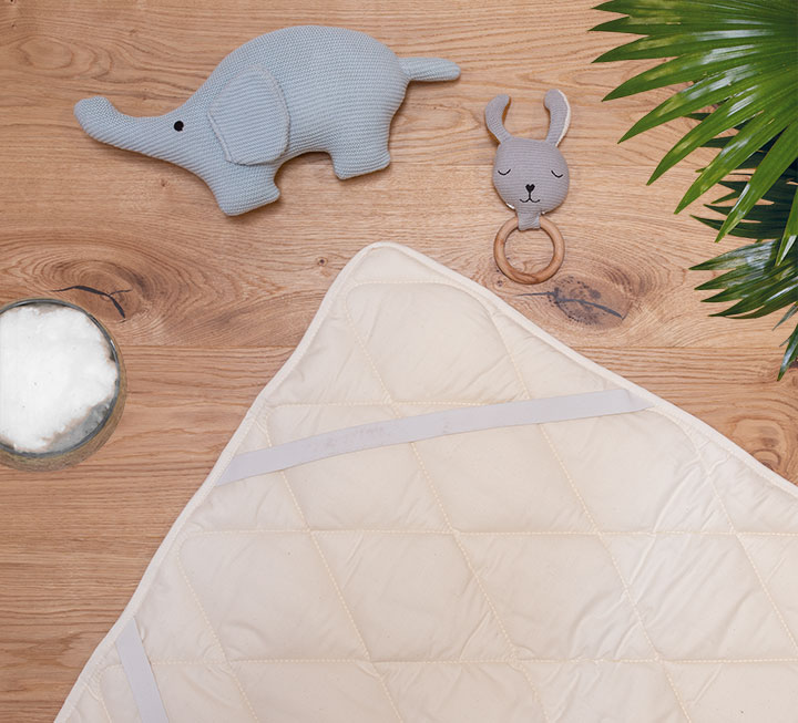 Feuchtigkeits-ausgleichendes Baby-Unterbett mit Lyocell-Füllung Feuchtigkeits-ausgleichendes Baby-Unterbett mit Lyocell-Füllung