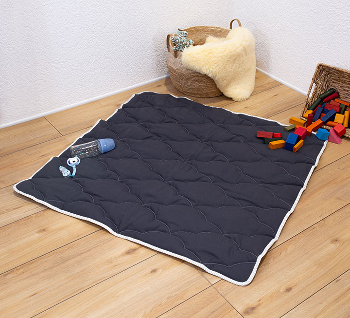 Pflegeleichte Wickelauflage mit weicher Lyocell-Füllung Pflegeleichte Wickelauflage mit weicher Lyocell-Füllung